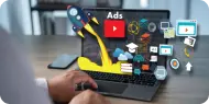Digital marketing services illustrated by online advertising, social media, and campaign icons above a laptop